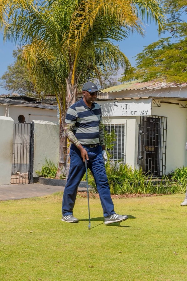 A golfer on the fairway during a Bogey Free round