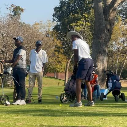 A golfer drives off the tee at Lusaka Golf Club